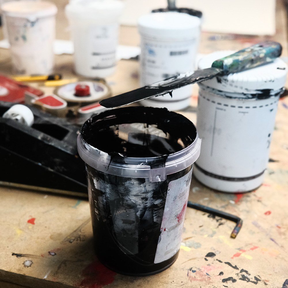 Can of black paint for SheOne's print