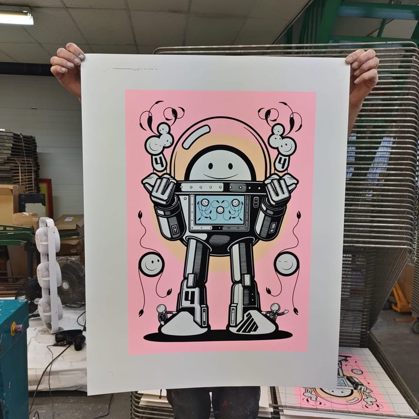 Bork holding Lads pink limited editon print by The London Police