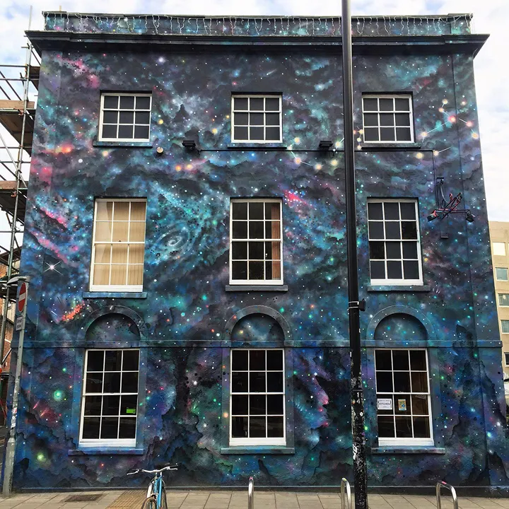 Cheba's mesmerizing mural on a building in Bristol