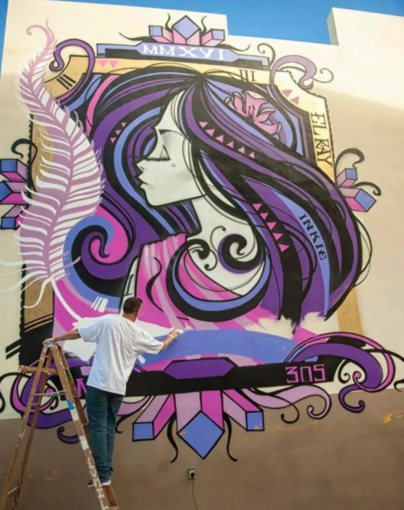 Inkie paints mural at Wynwood, Miami