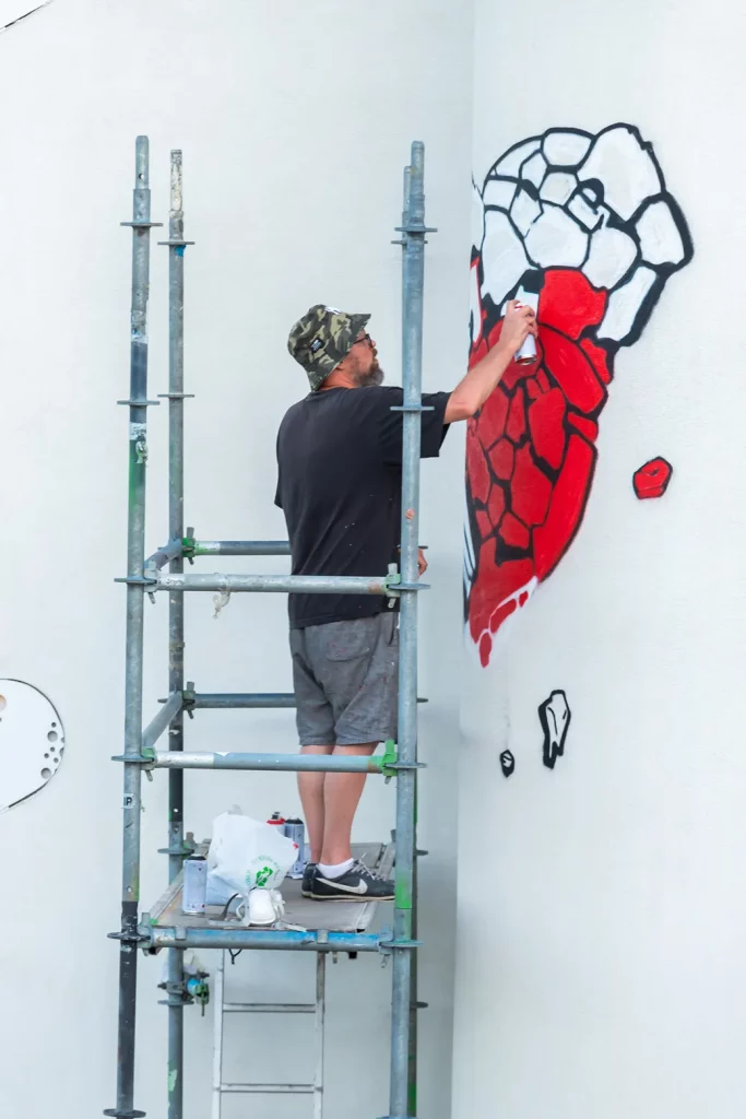 Nick Walker paints a mural "Loveitation" at 2B Art Gallery Calvia